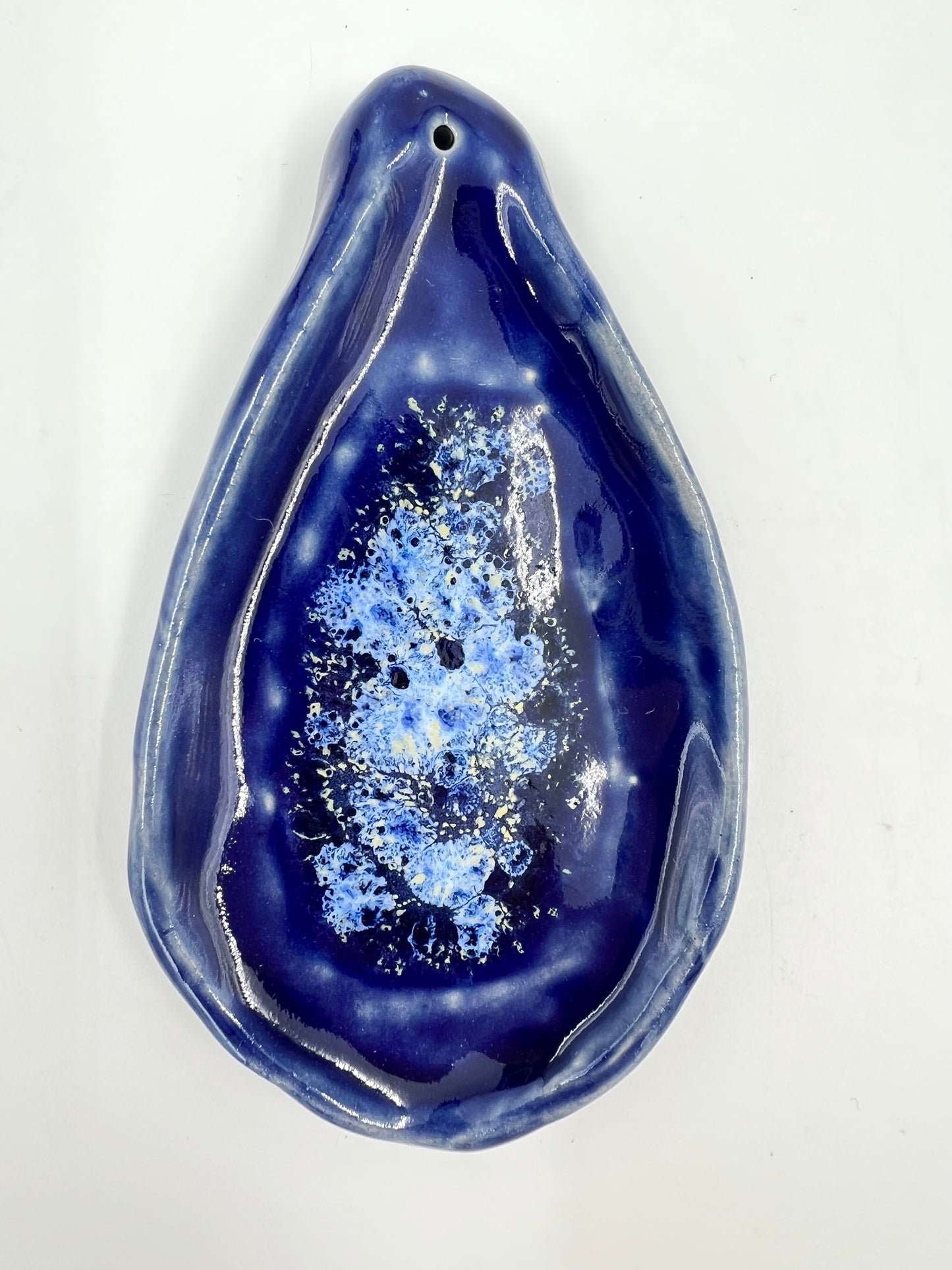 Blombruden rökelsehållare blå ljusblå