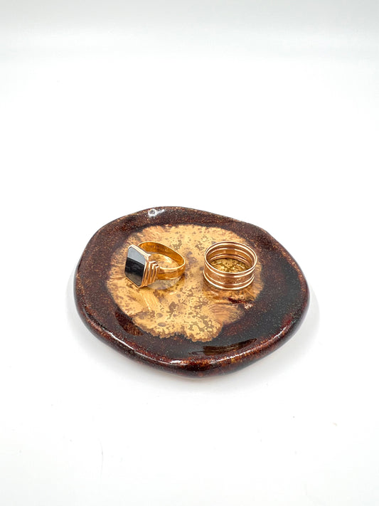 Blombruden litet fat brun glitter