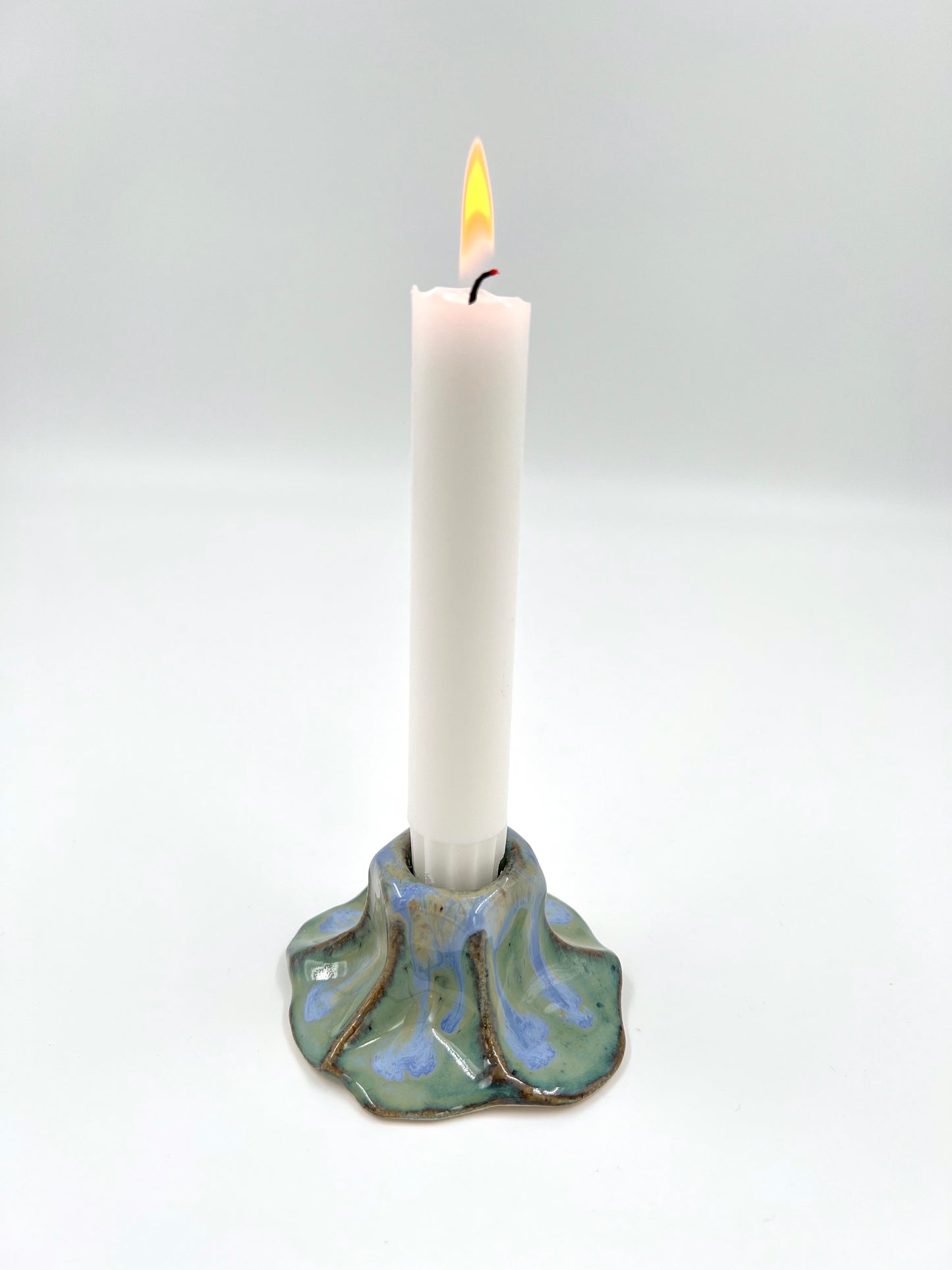 Blombruden ljusstake turkos ljusblå