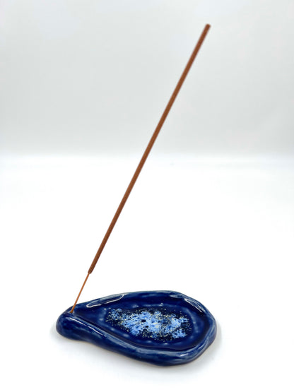 Blombruden rökelsehållare blå ljusblå