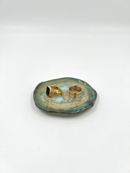 Blombruden litet fat turkos beige