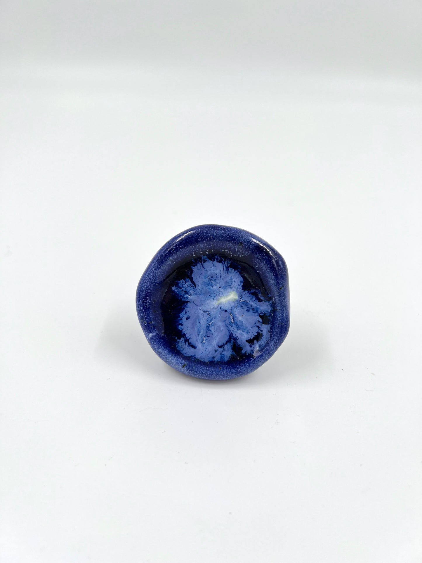 Blombruden knopp blå