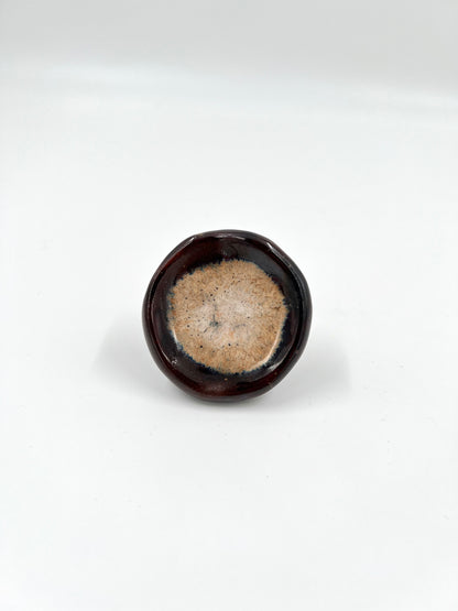 Blombruden knopp brun