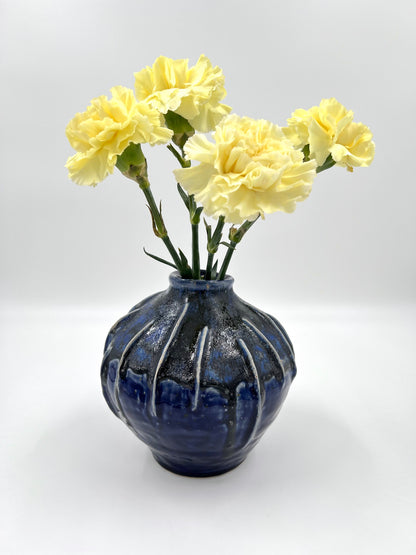 Blombruden vas rund blå