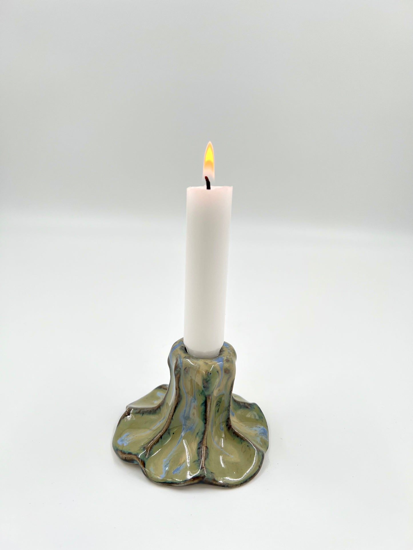 Blombruden ljusstake turkos ljusblå