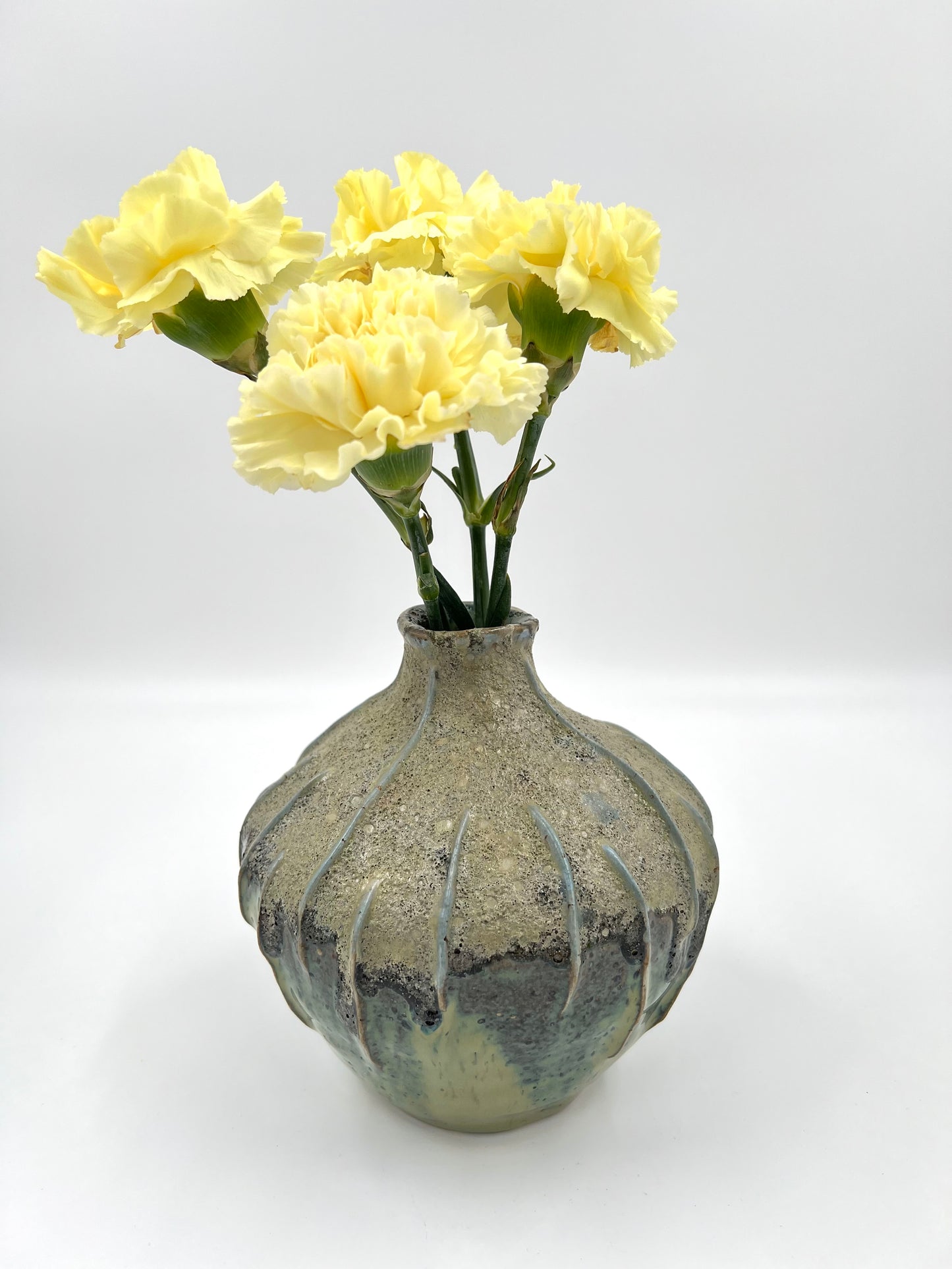 Blombruden vas rund turkos