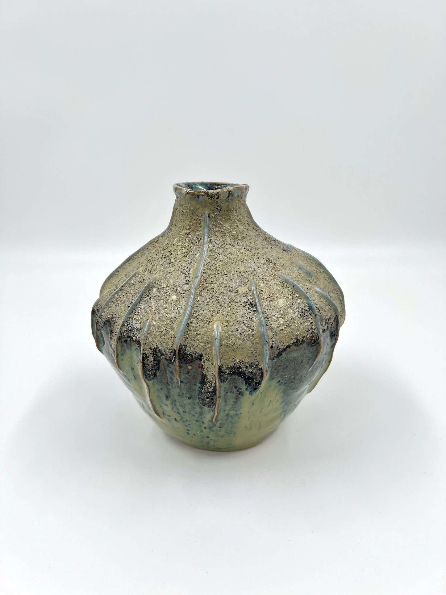 Blombruden vas rund turkos