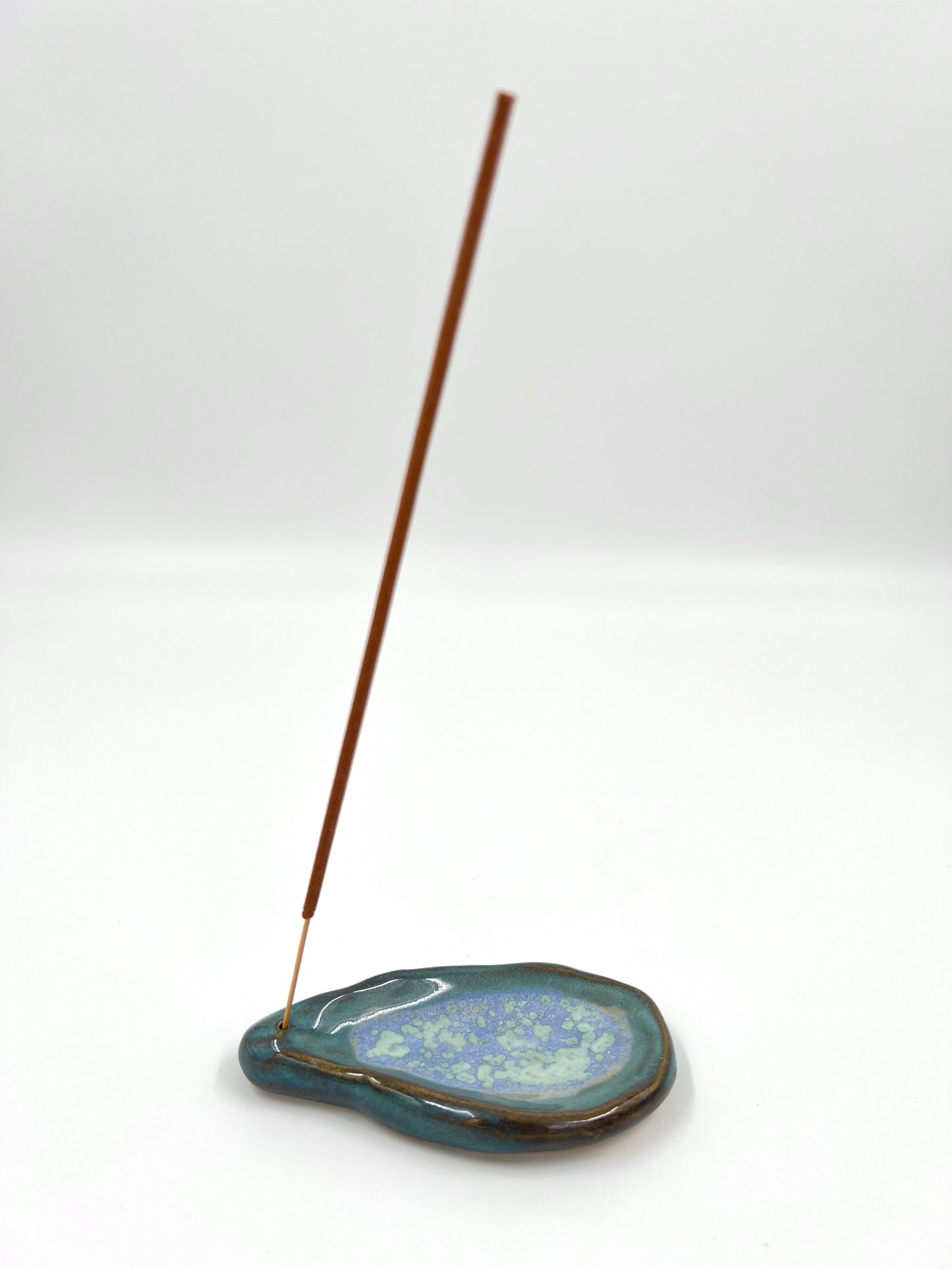 Blombruden rökelsehållare turkos ljusblå